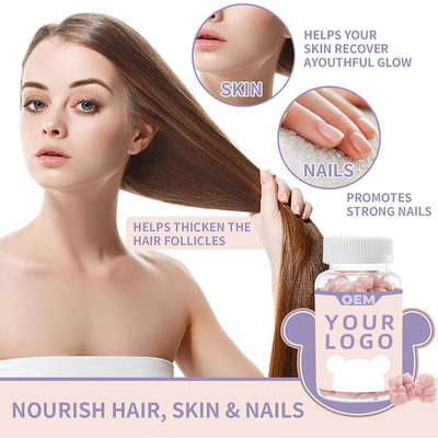 La salud del pelo complementa la biotina de las vitaminas de las mujeres la extensión ácida fólica del pelo del veganformula de peluche de los gummies rosados del oso